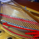 Révision et changement de cordes sur le Steinway C227
